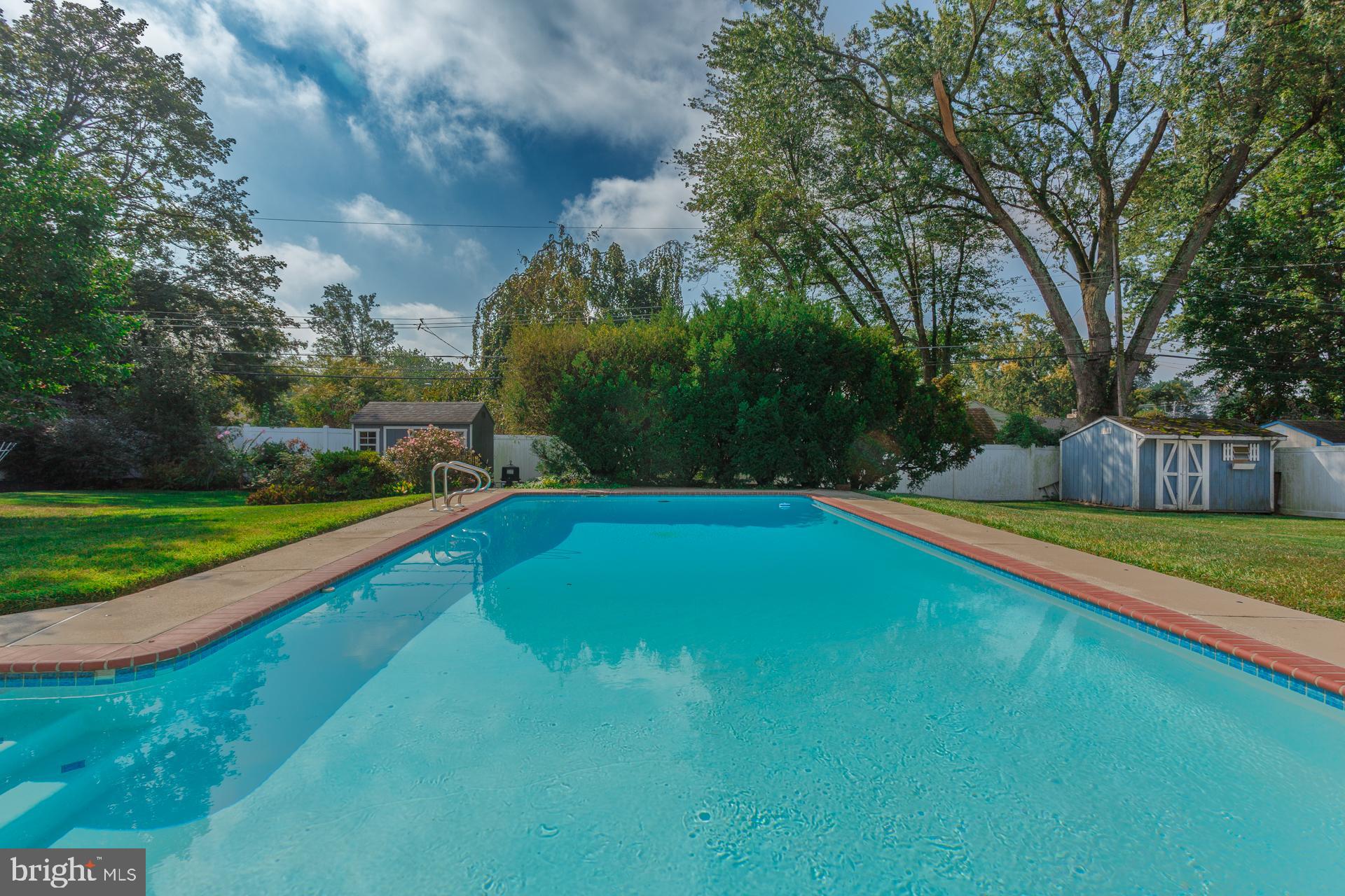 2017 Quarry Road Yardley, PA 19067 - Photo 33 of 37 a view of a swimming pool and a yard