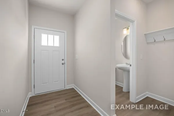 a bathroom with a sink a large mirror and a shower