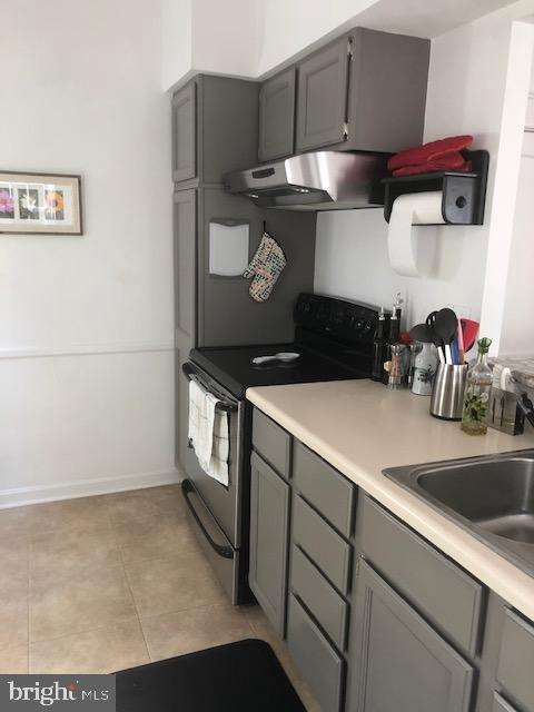 41 Chatham Road Ardmore, PA 19003 - Photo 11 of 20 a kitchen with stainless steel appliances a refrigerator a sink a stove and cabinets