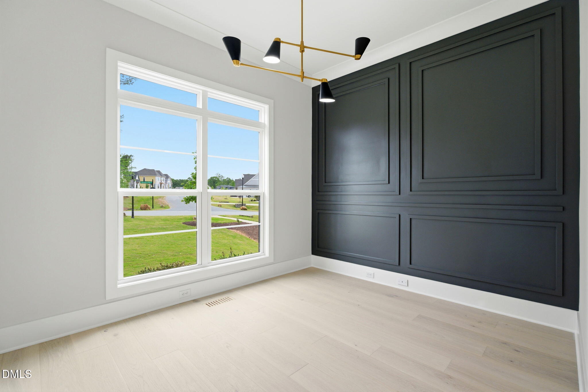 1304 Sanctuary Pond Drive Raleigh, NC 27606 - Photo 25 of 52 a view of an empty room with a window
