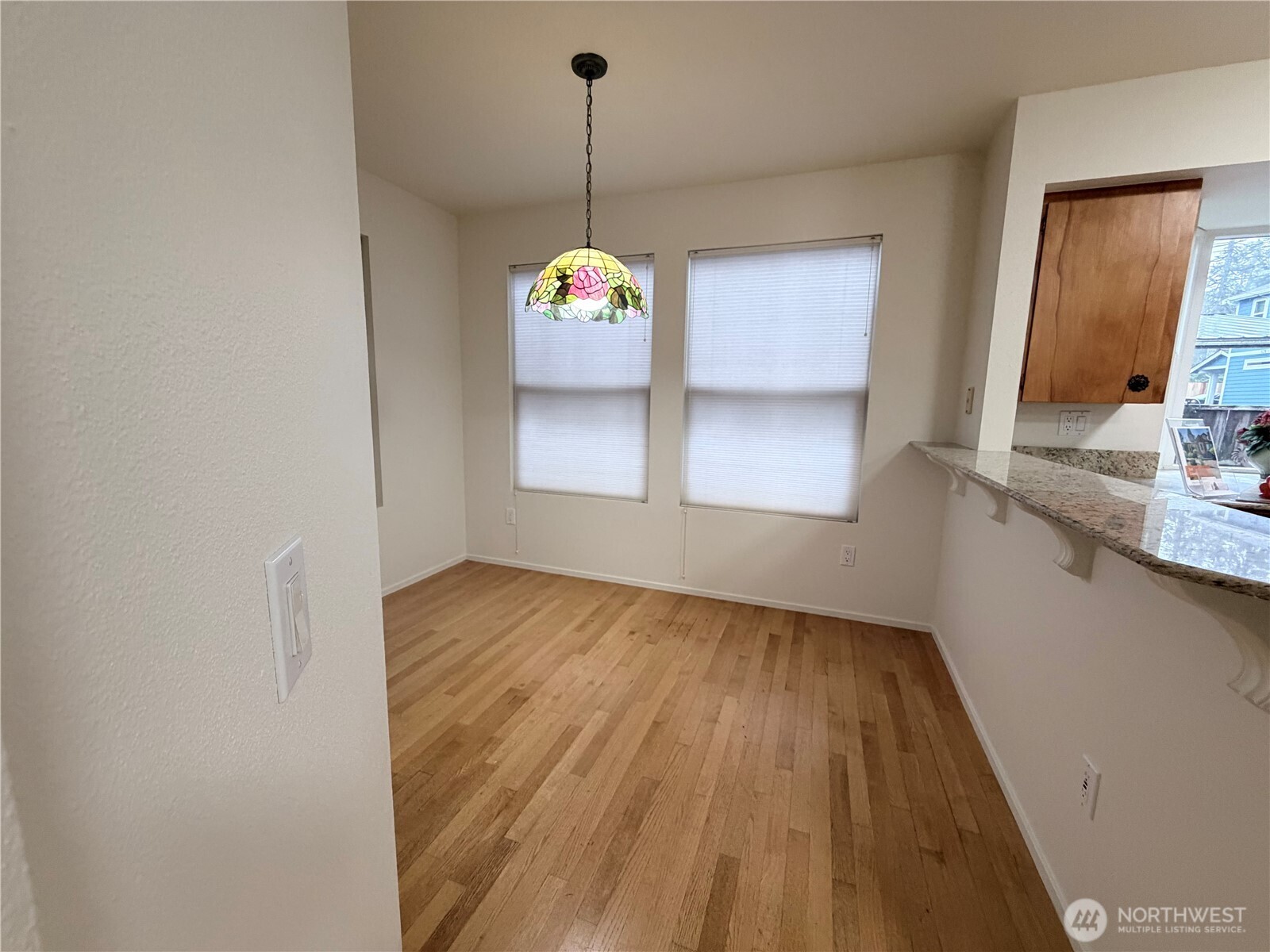 517 South 3rd Street McCleary, WA 98557 - Photo 16 of 38 a view of a room with wooden floor and windows