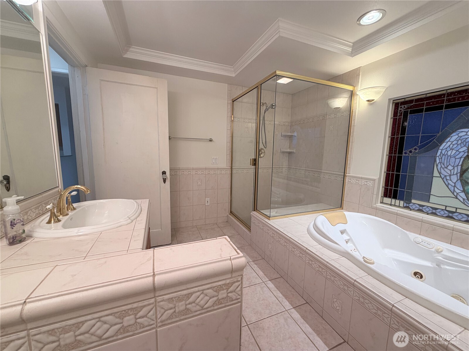 517 South 3rd Street McCleary, WA 98557 - Photo 20 of 38 a bathroom with a tub sink and mirror