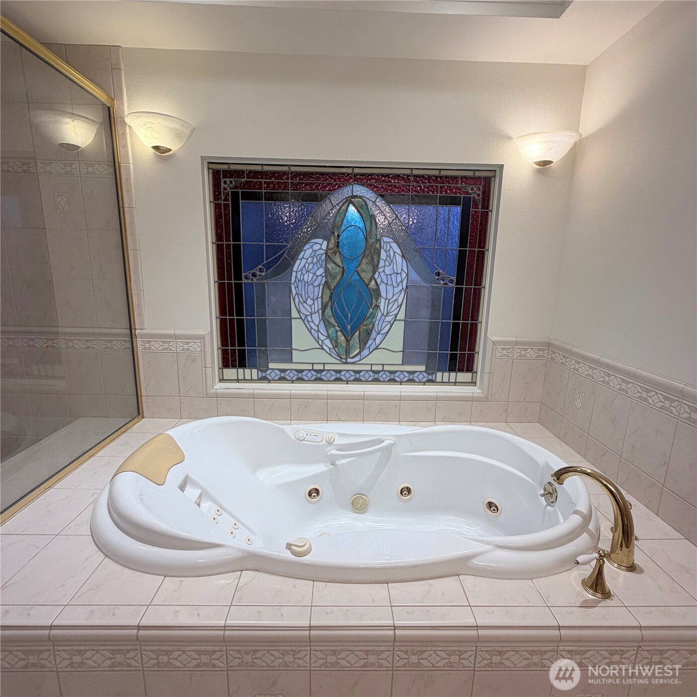 517 South 3rd Street McCleary, WA 98557 - Photo 21 of 38 a bathroom with a tub and shower