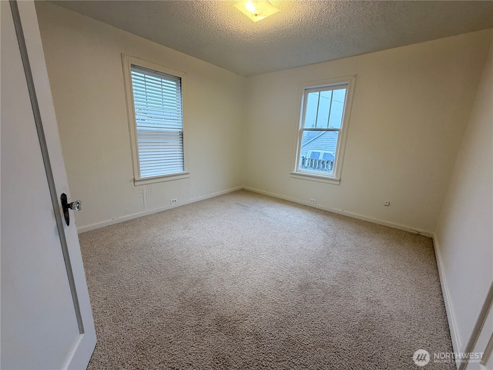 517 South 3rd Street McCleary, WA 98557 - Photo 24 of 38 an empty room with windows