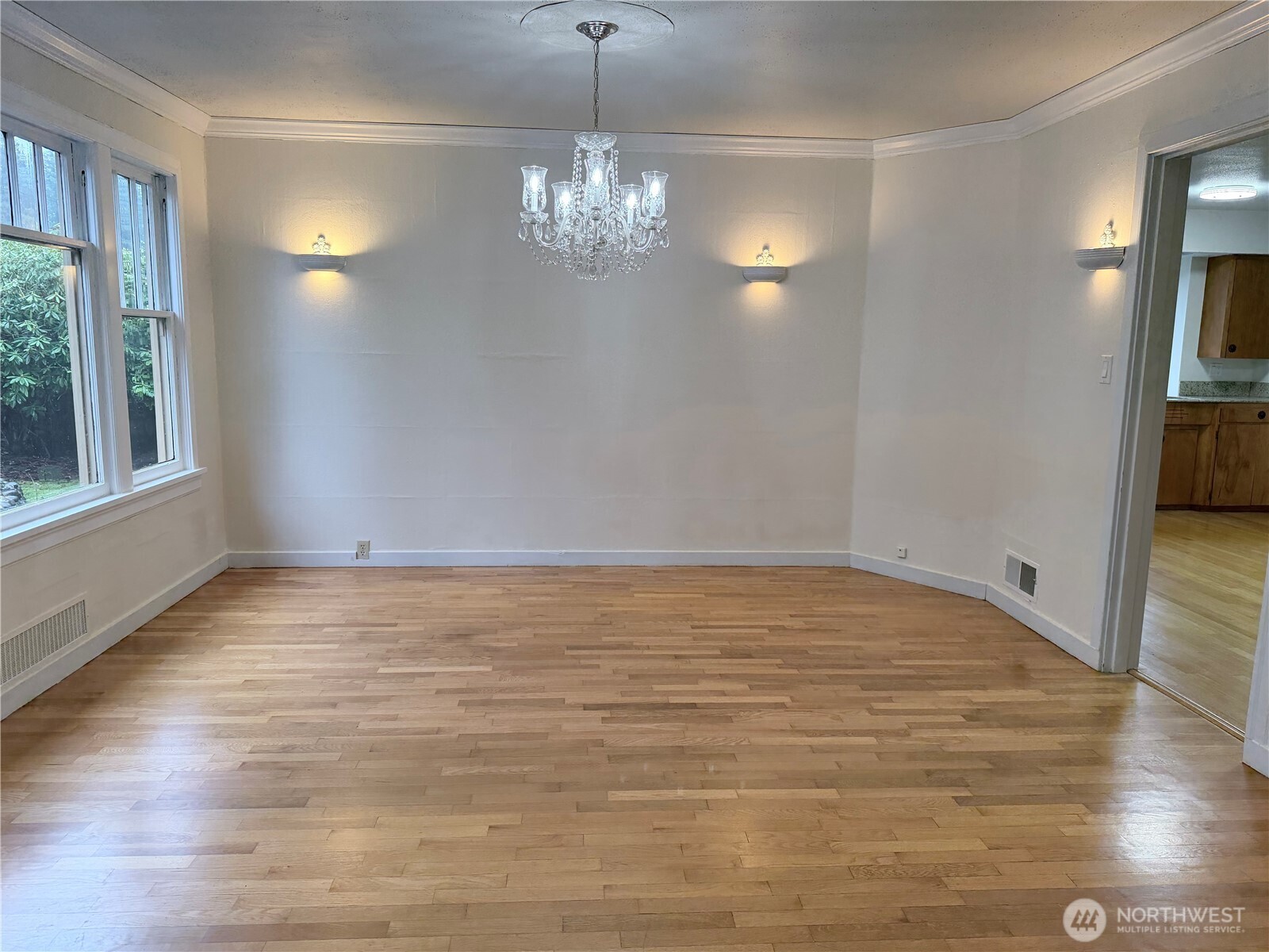 517 South 3rd Street McCleary, WA 98557 - Photo 7 of 38 a view of empty room with wooden floor and fan