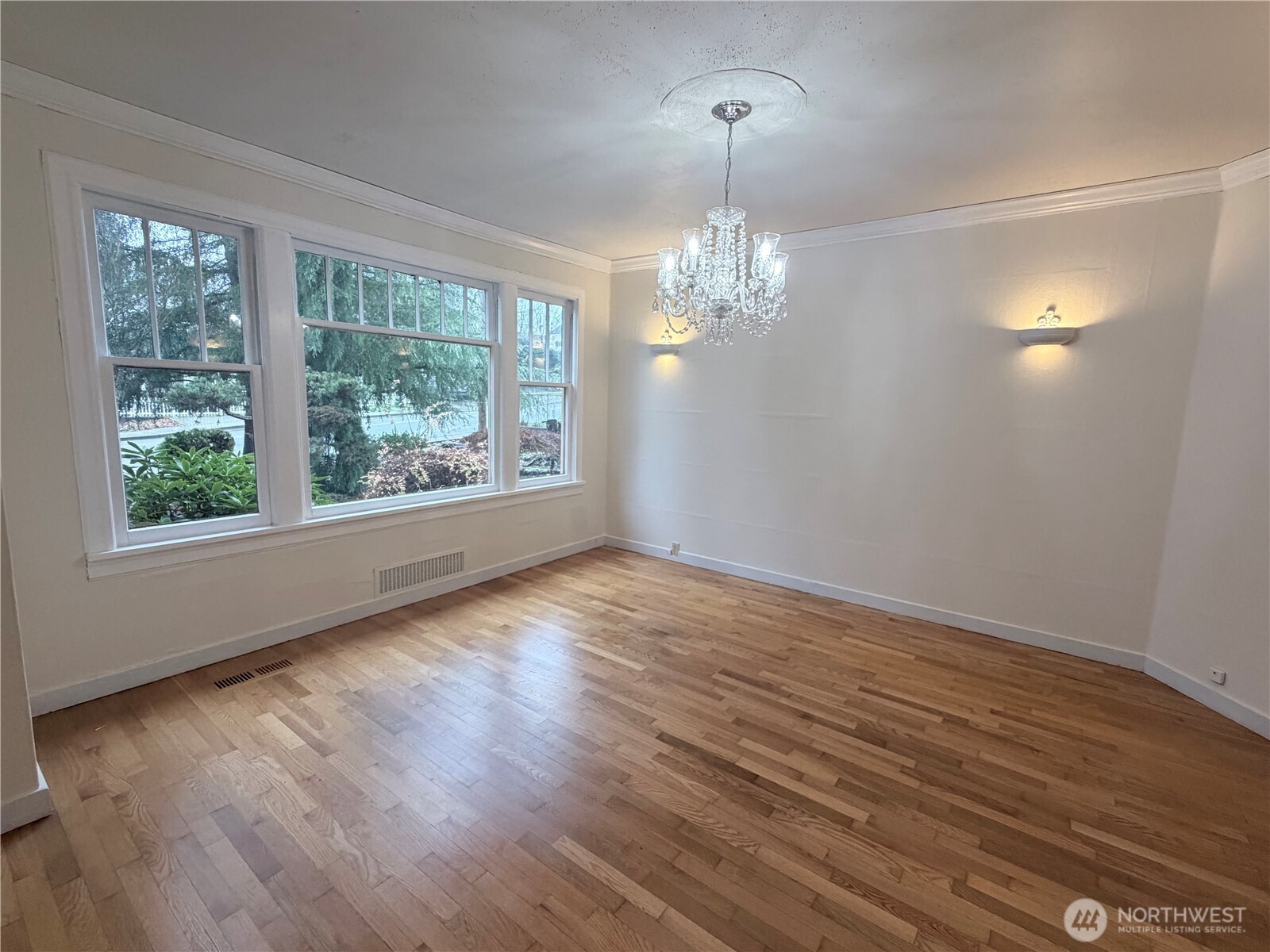 517 South 3rd Street McCleary, WA 98557 - Photo 8 of 38 a view of empty room with wooden floor and fan