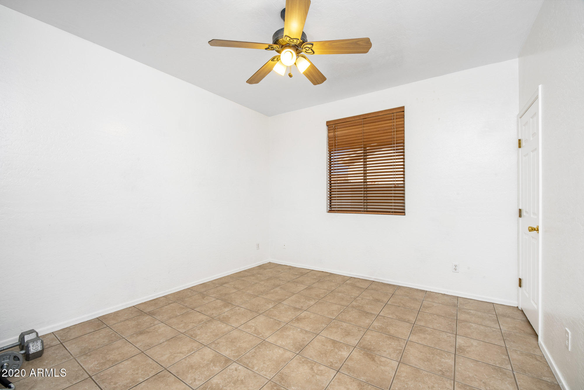 6938 West Rowel Road Peoria, AZ 85383 - Photo 31 of 38 Downstairs guest bedroom 1
