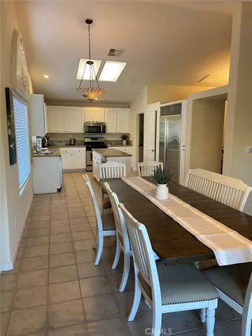 a dining room with furniture