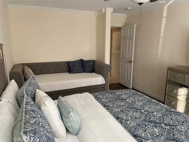 a living room with a couch and a rug