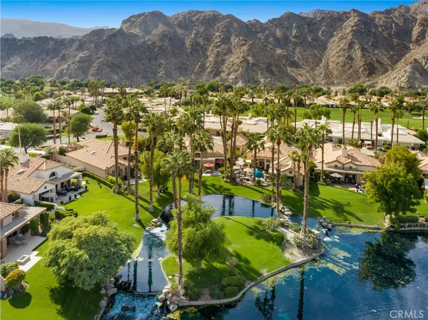 a view of residential houses with outdoor space