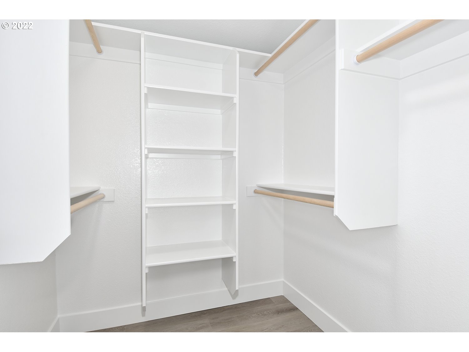 1465 Southeast Maple Loop Gresham, OR 97080 - Photo 19 of 32 a picture of a room with shelf