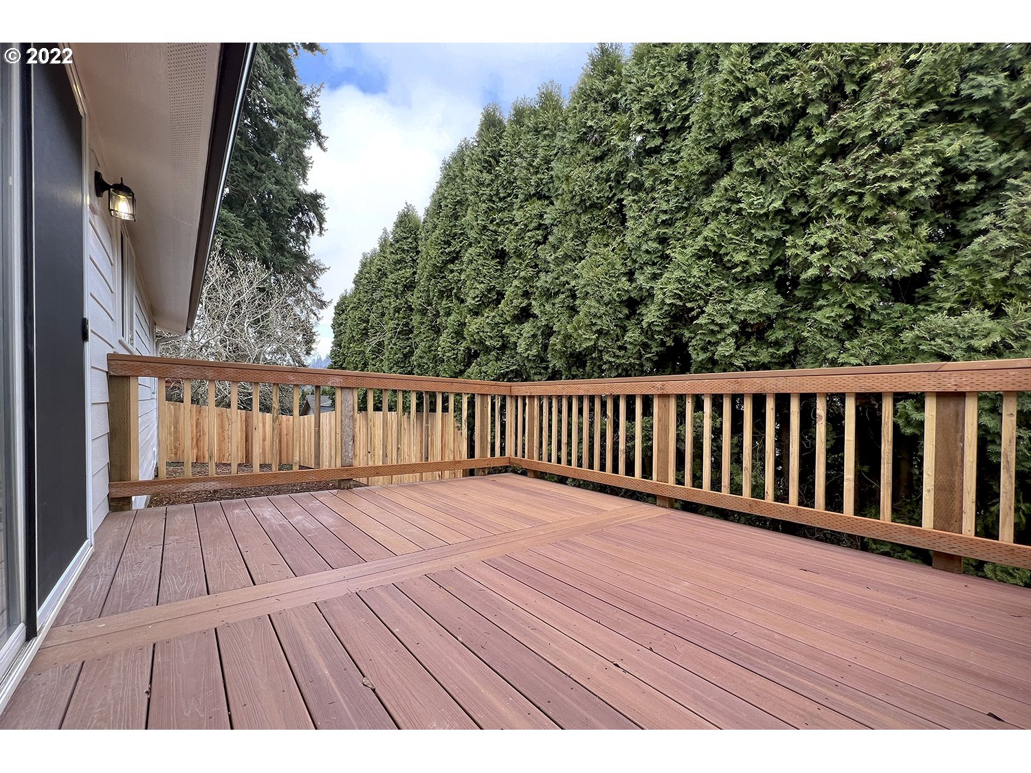 1465 Southeast Maple Loop Gresham, OR 97080 - Photo 26 of 32 a view of wooden balcony with wooden floor