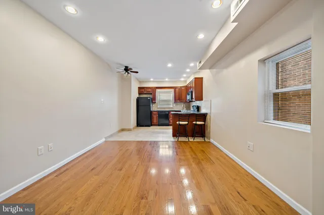 a view of kitchen with wooden floor