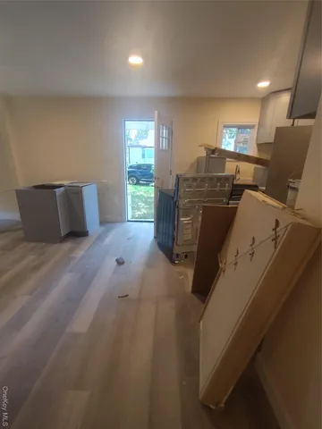 a bed room with furniture and a window