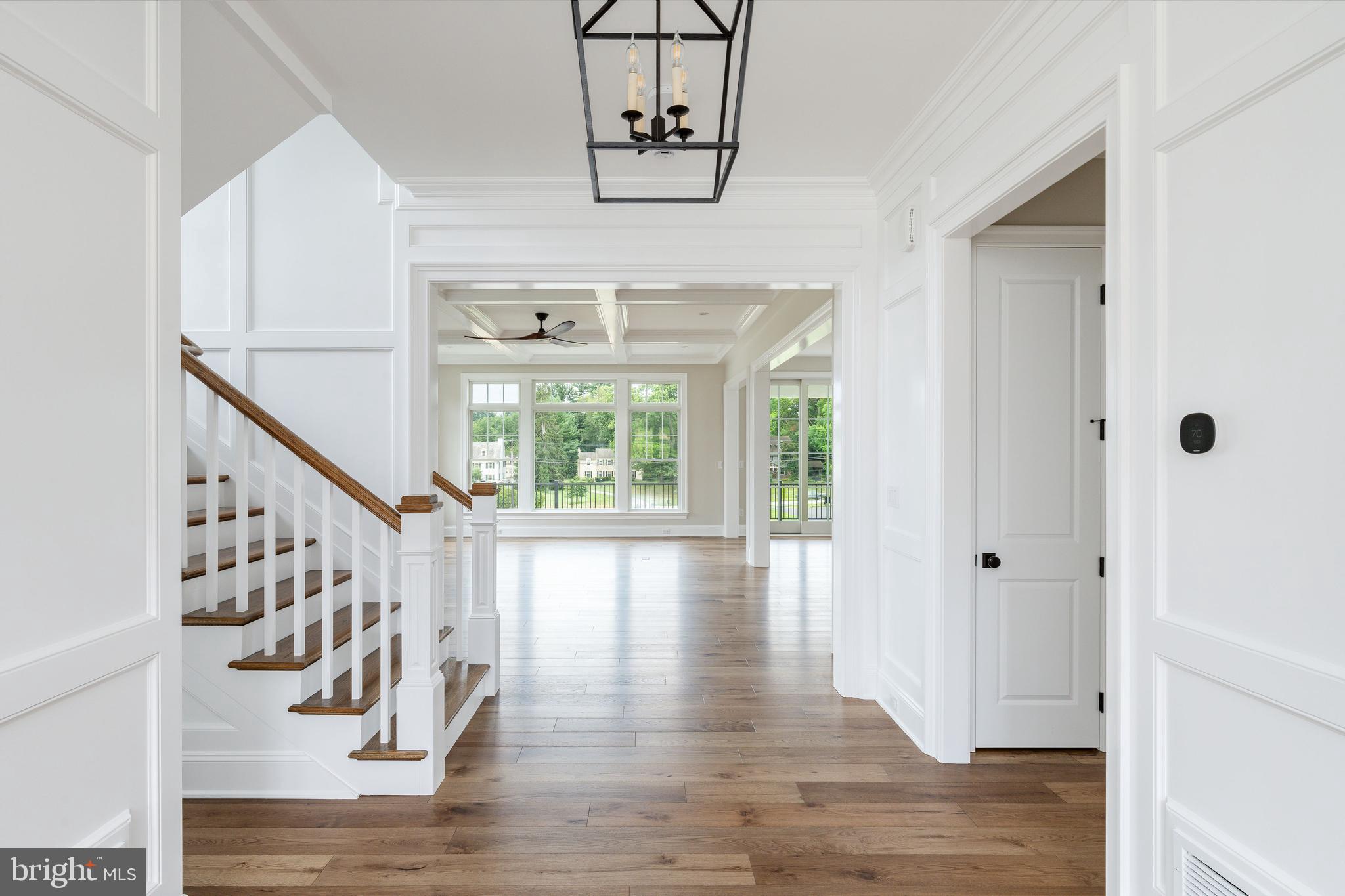 117 Lexington Manor Glenmoore, PA 19343 - Photo 9 of 11 a view of an entryway with wooden floor