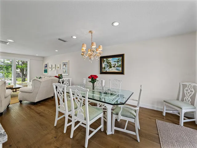 an aerial view of a house with outdoor space and street view