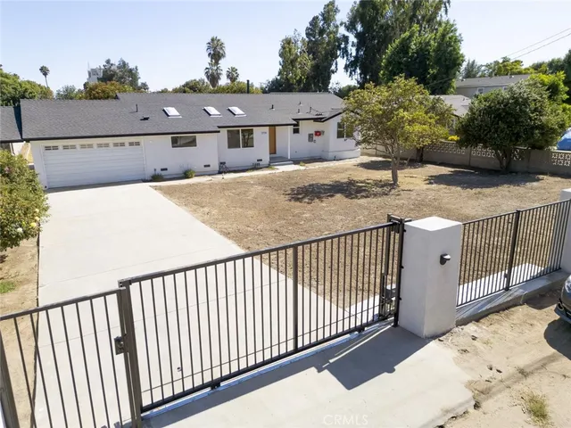 a view of staircase and kitchen view