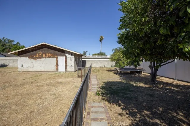 a front view of house with a yard