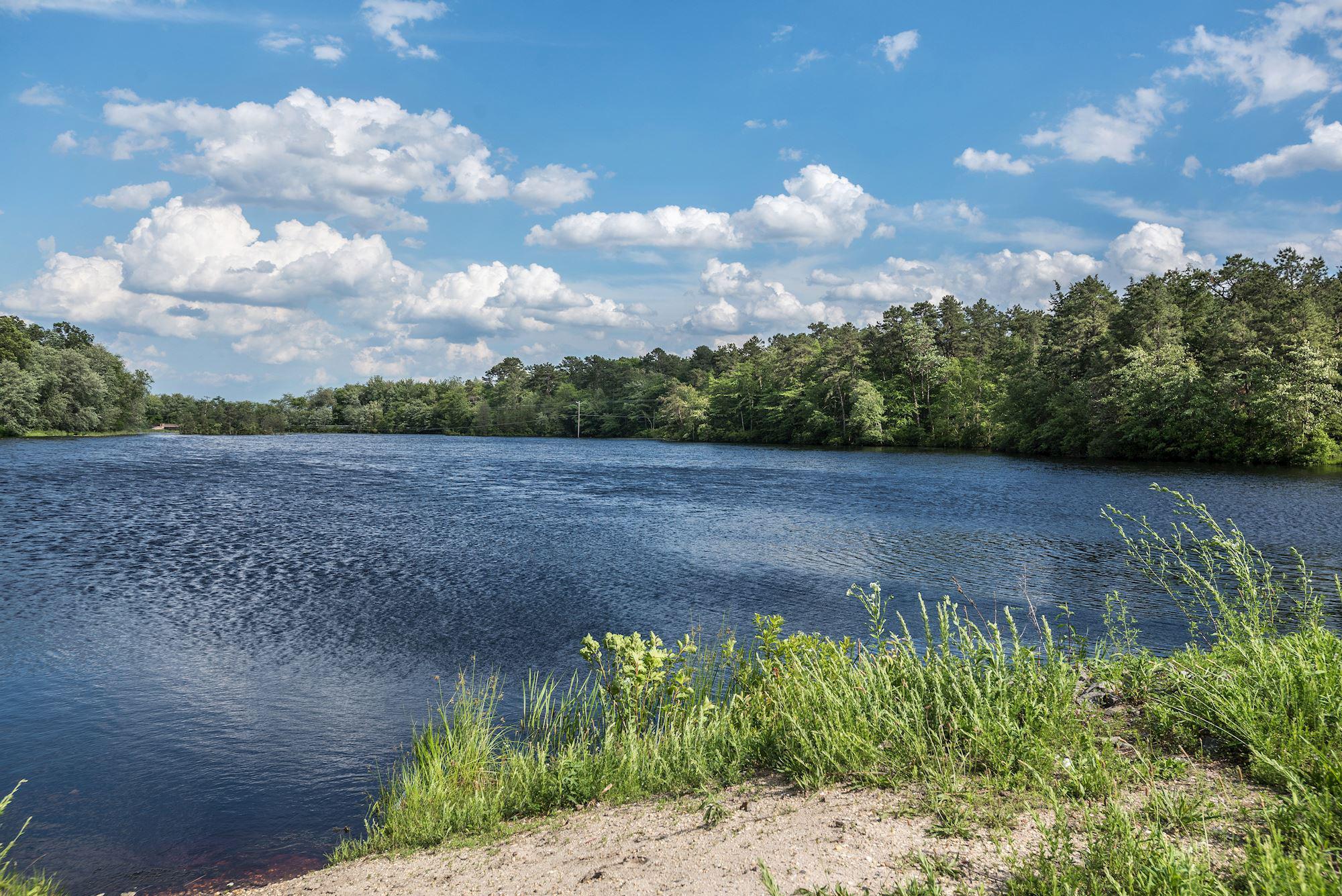 603 New Jersey Road Browns Mills, NJ 08015 - Photo 25 of 28 Tranquil waters under a blue sky.