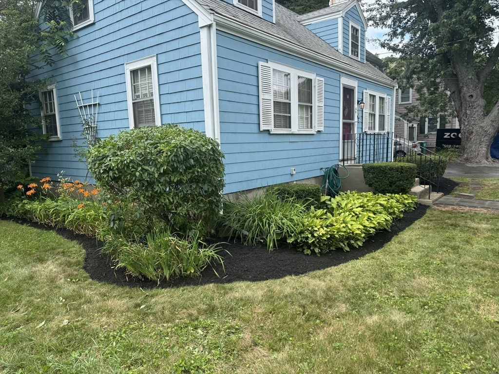 a view of a house with a garden