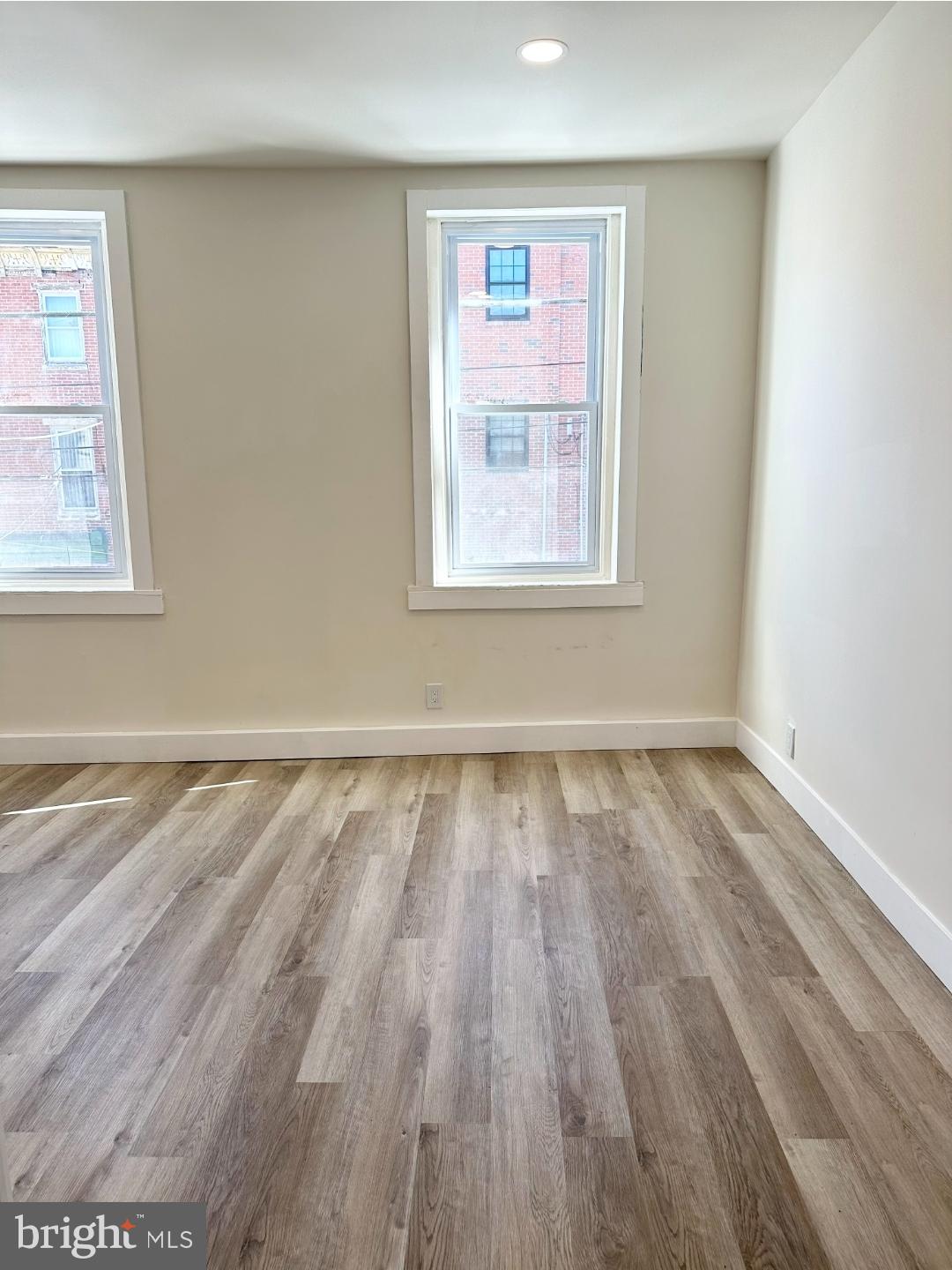 1532 South 2nd Street, Unit 2F Philadelphia, PA 19147 - Photo 15 of 19 a view of a room with wooden floor and window