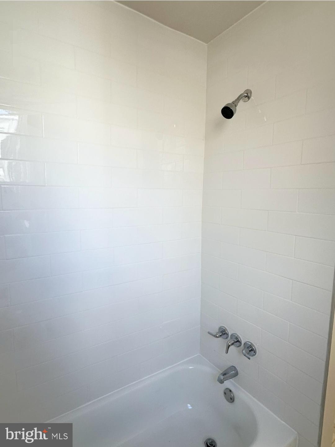 1532 South 2nd Street, Unit 2F Philadelphia, PA 19147 - Photo 18 of 19 a bathroom with a tub and a sink
