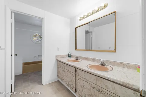 a living room with furniture fireplace and flat screen tv