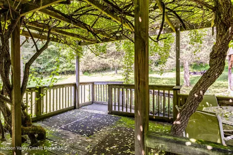 a view of a porch with a yard