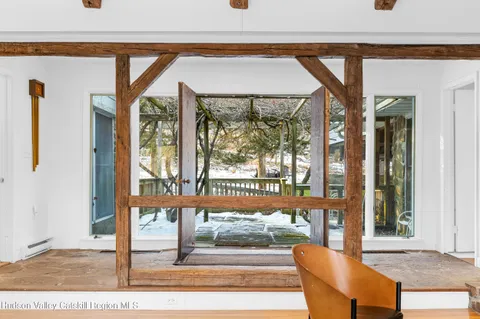 a view of a living room with furniture