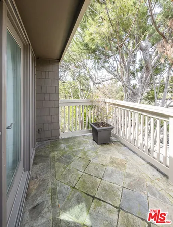 a view of a porch with furniture