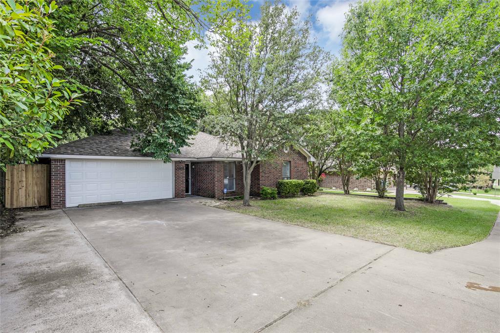 1908 Paisley Street Denton, TX 76209 - Photo 1 of 1 a view of a house with a yard and large tree