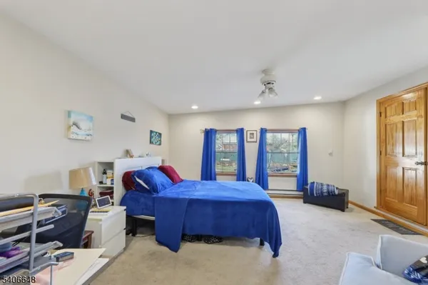 a bed room with a bed and a couch