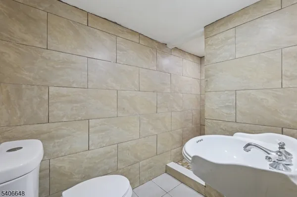 a bathroom with a sink and a toilet