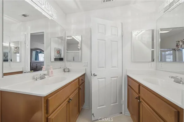 a view of a sink and a mirror