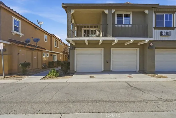 a view of brick building with many windows