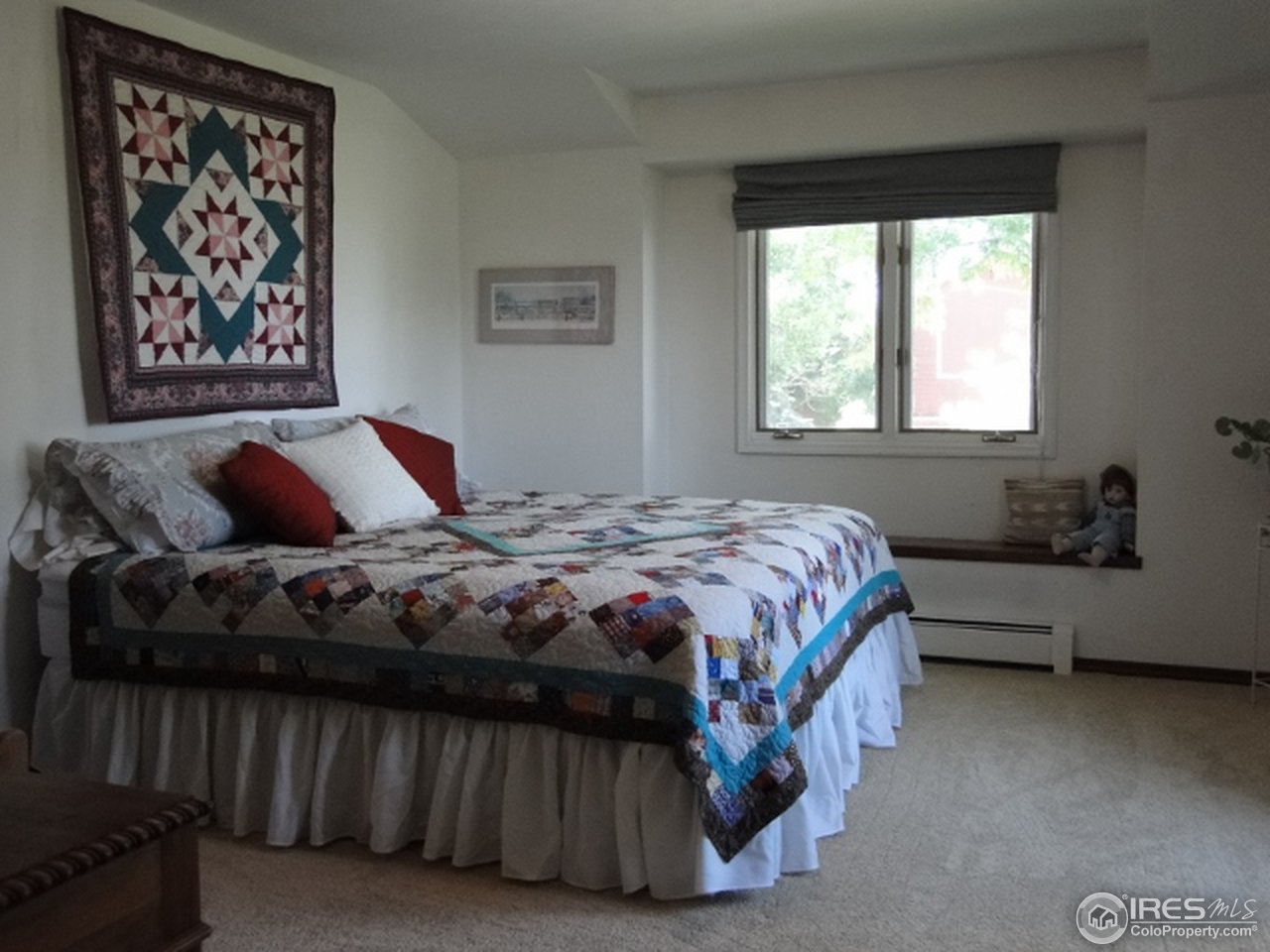9268 County Road 28 Fort Lupton, CO 80621 - Photo 24 of 25 a bedroom with a bed and window