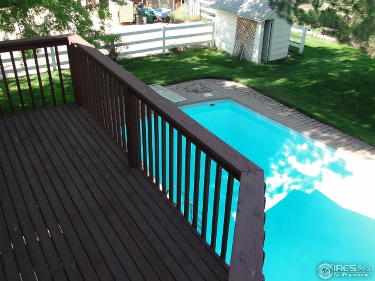 9268 County Road 28 Fort Lupton, CO 80621 - Photo 25 of 25 a view of a balcony with a yard
