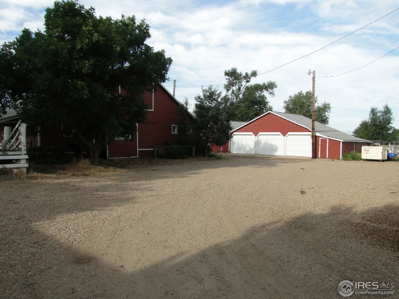 9268 County Road 28 Fort Lupton, CO 80621 - Photo 6 of 25 a front view of a house with a yard