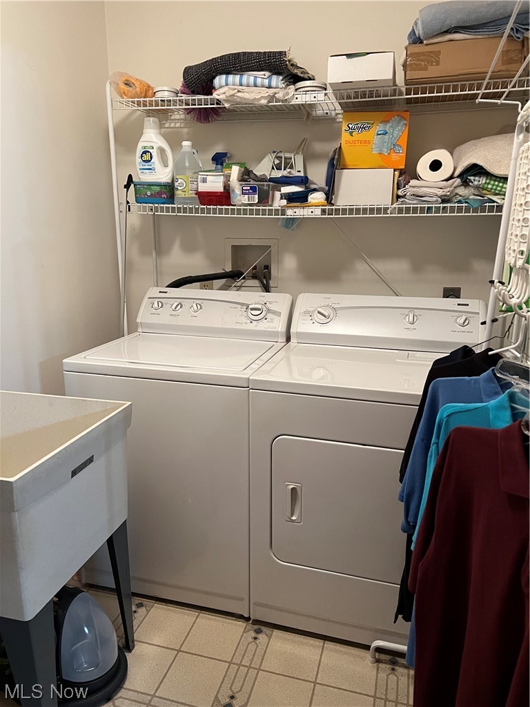 4583 Baldwin Road Kingsville, OH 44048 - Photo 28 of 35 Main floor laundry 9 x 6 with wash tub off the garage. Washer and dryer included.