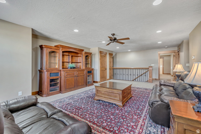 896 West 675 South Mapleton, UT 84664 - Photo 31 of 77 Living room with recessed lighting, a textured ceiling, and ceiling fan