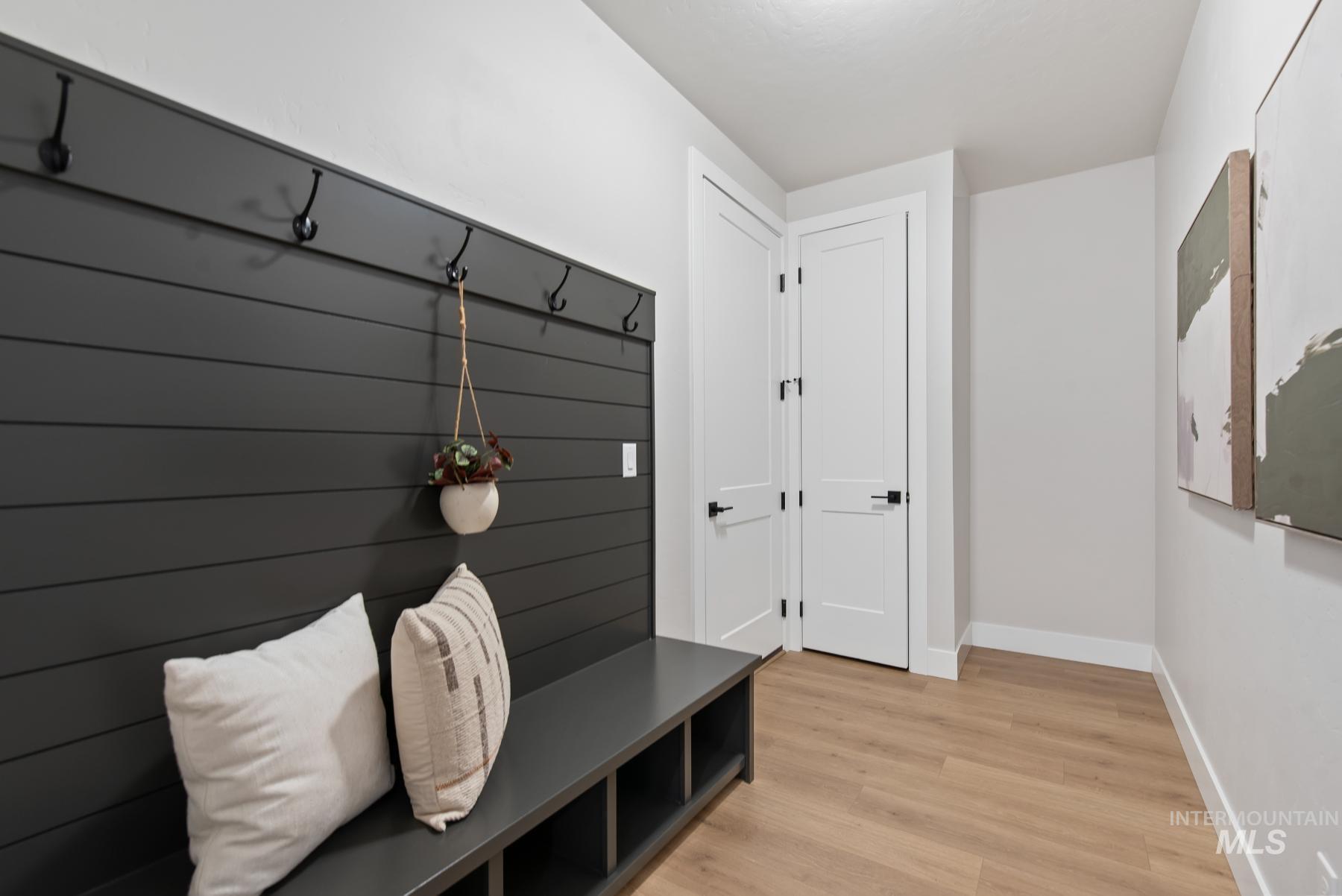 8410 West Graye Street, Unit ALPINE Meridian, ID 83646 - Photo 29 of 45 Room featuring light gray walls, white trim, and a patterned carpet