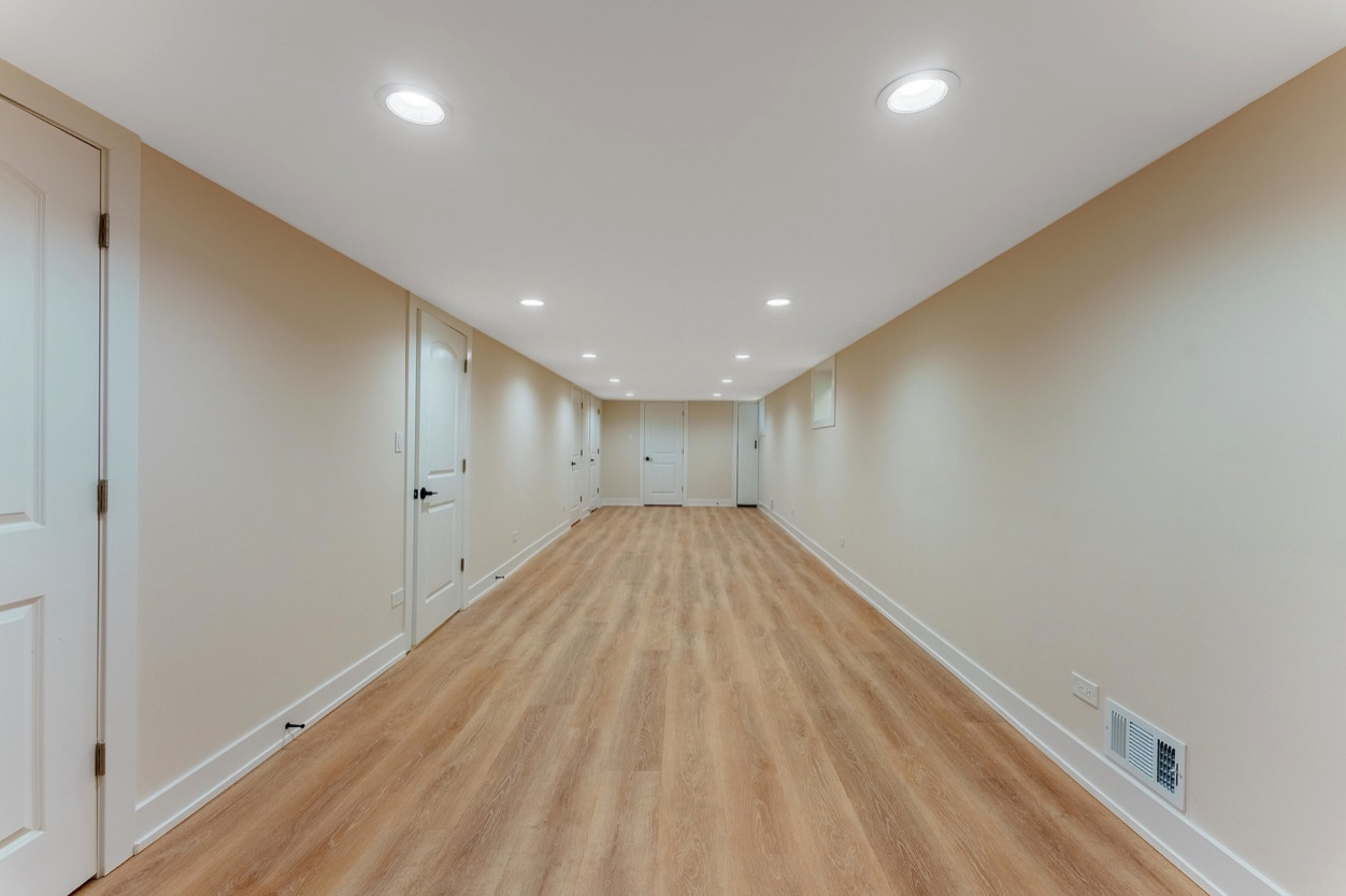6210 West 64th Street Chicago, IL 60638 - Photo 13 of 14 a view of empty room with wooden floor