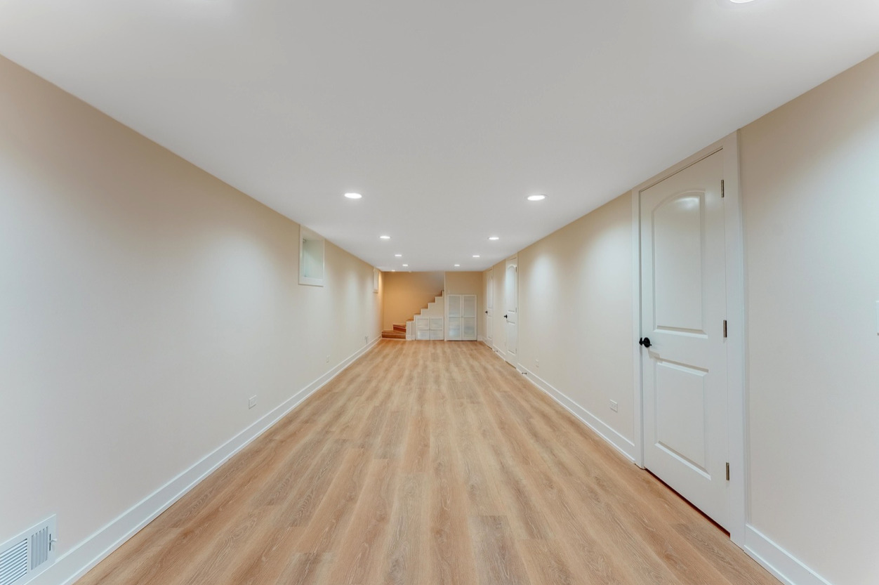 6210 West 64th Street Chicago, IL 60638 - Photo 7 of 14 a view of hallway with wooden floor