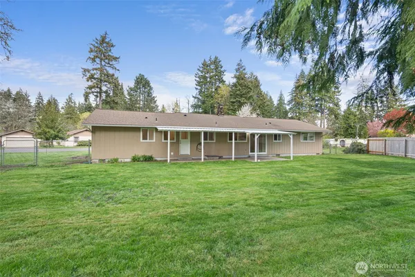 a view of a house with a garden