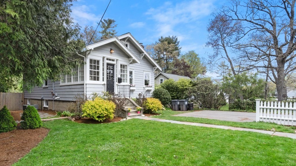 155 Marked Tree Road Needham, MA 02492 - Photo 1 of 34 a front view of a house with garden