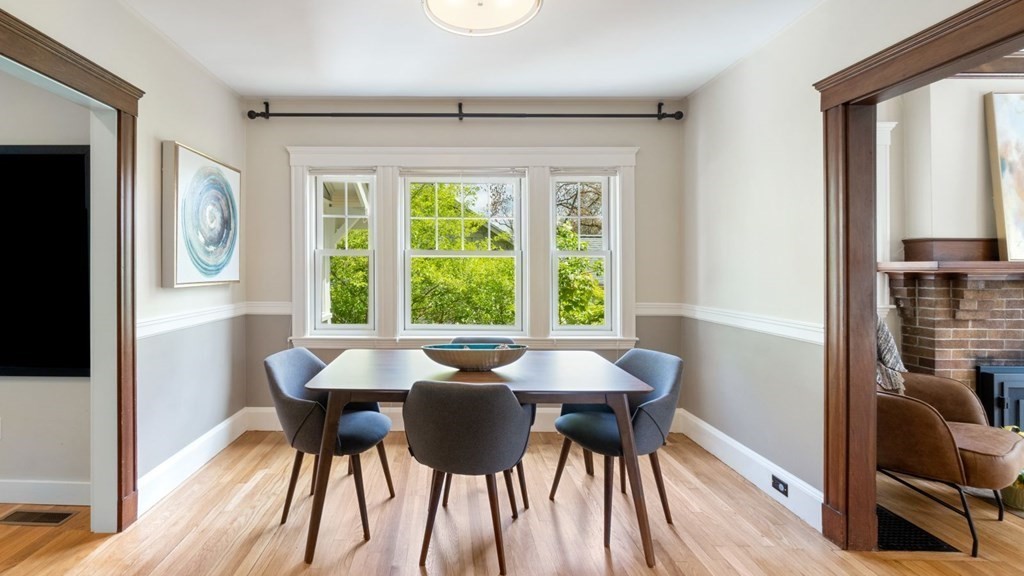 155 Marked Tree Road Needham, MA 02492 - Photo 11 of 34 a view of a dining room with furniture and a window