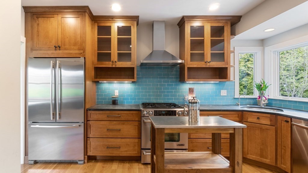 155 Marked Tree Road Needham, MA 02492 - Photo 14 of 34 a kitchen that has a cabinets counter space and a window
