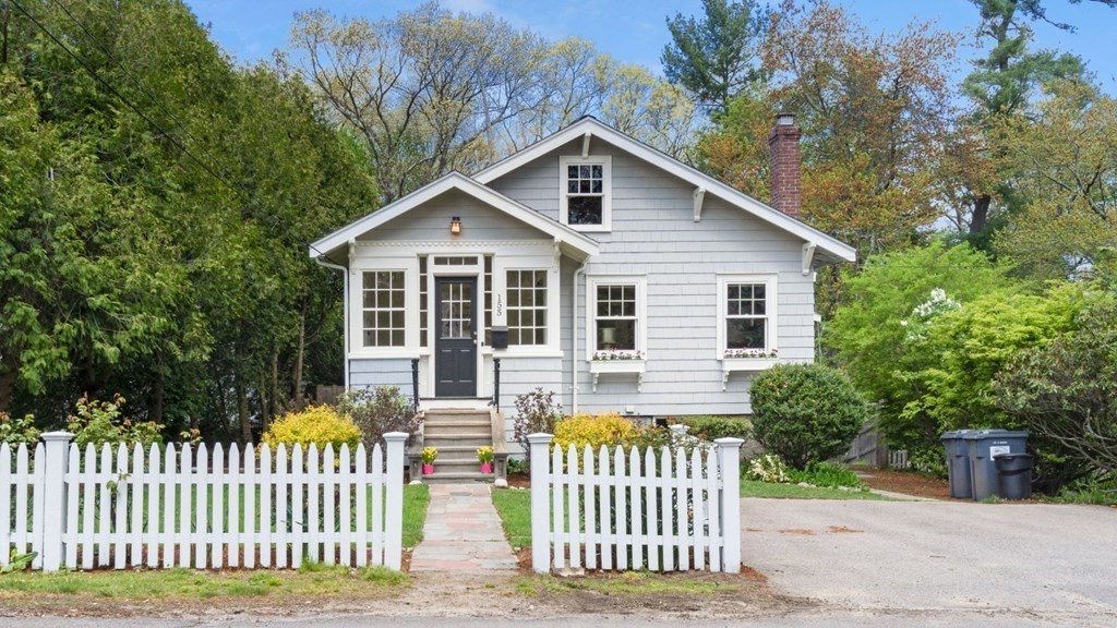 155 Marked Tree Road Needham, MA 02492 - Photo 2 of 34 a front view of a house with a garden