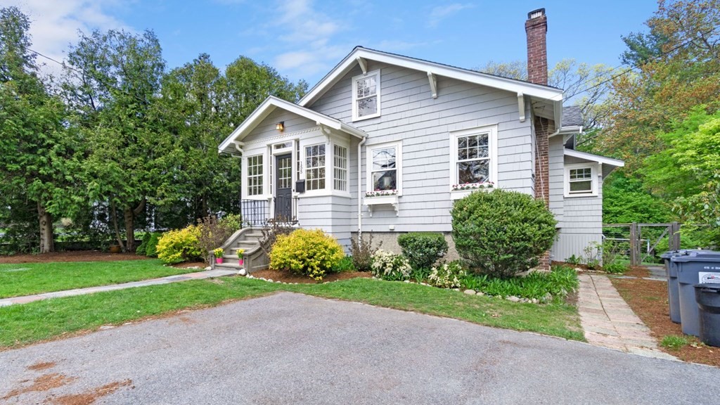 155 Marked Tree Road Needham, MA 02492 - Photo 26 of 34 a front view of house with yard and green space