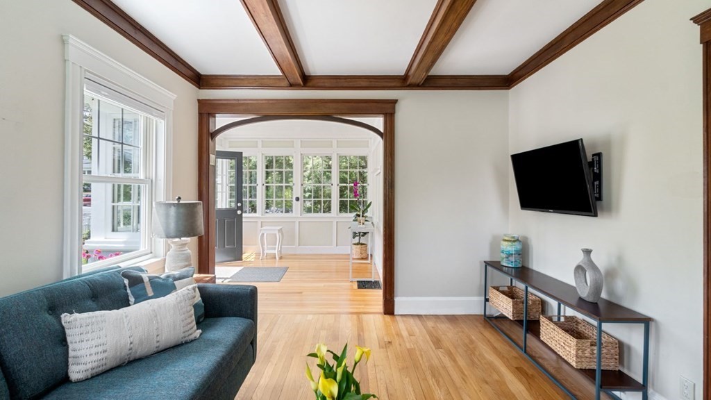 155 Marked Tree Road Needham, MA 02492 - Photo 5 of 34 a living room with furniture and a flat screen tv